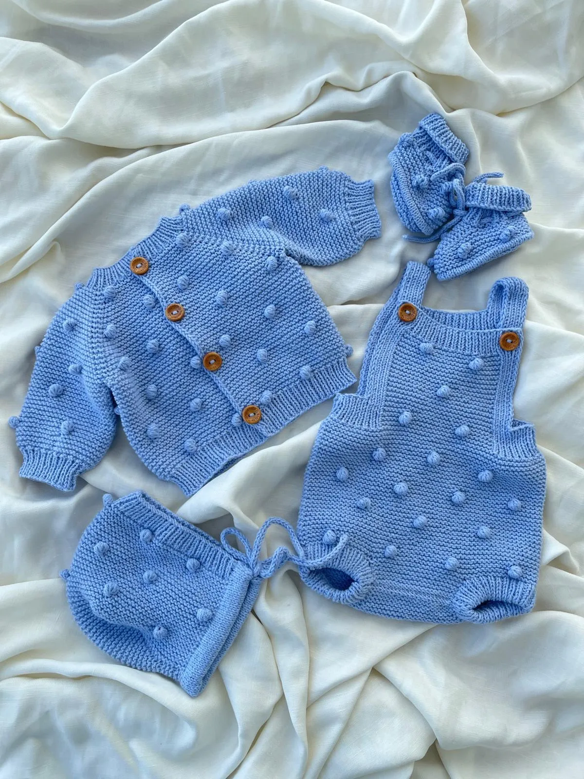 Beautiful Blue Hand Knitted 4 piece set.