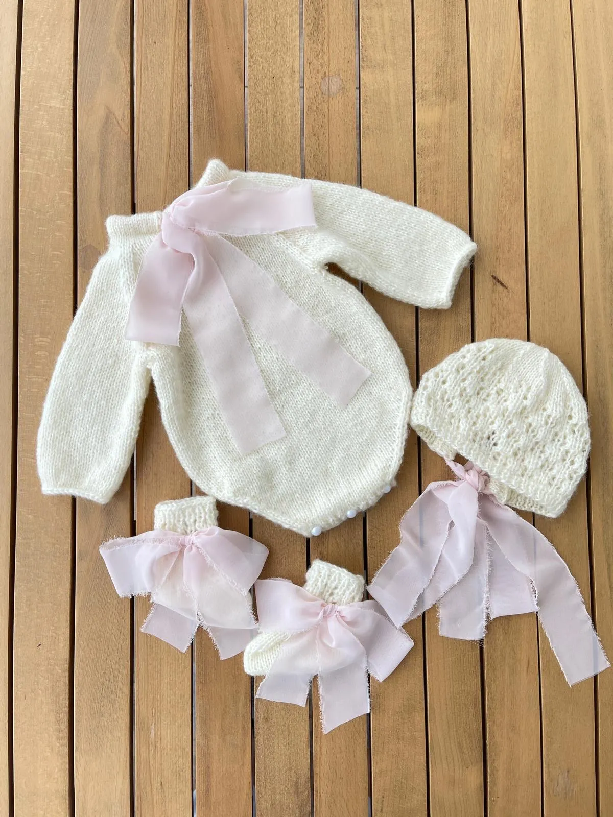 Beautiful Hand Knitted 3 piece set with bow details.