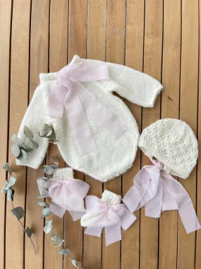Beautiful Hand Knitted 3 piece set with bow details.
