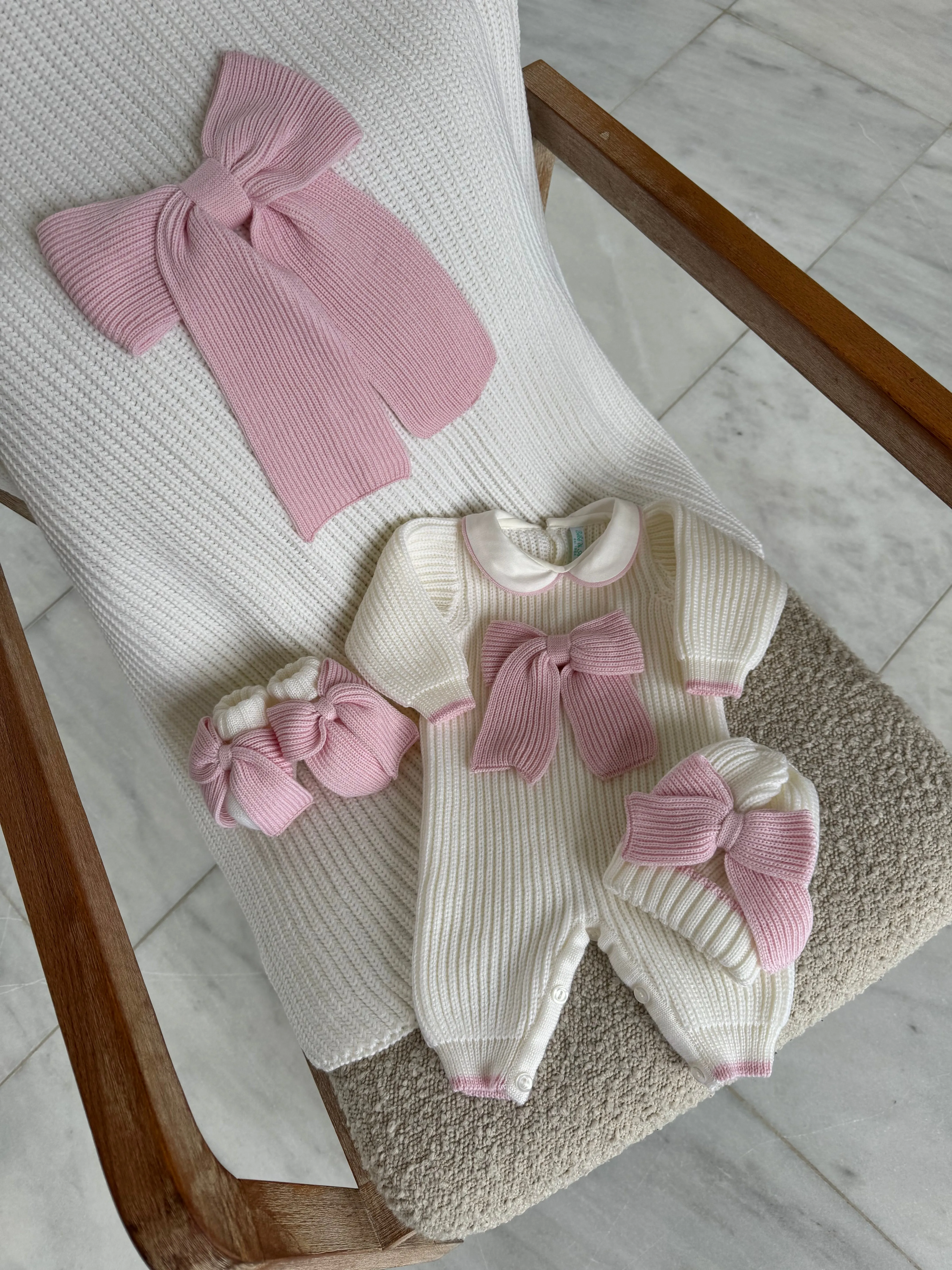 Beautiful knitted Merino Wool Ivory/White Baby Booties with Bow details.