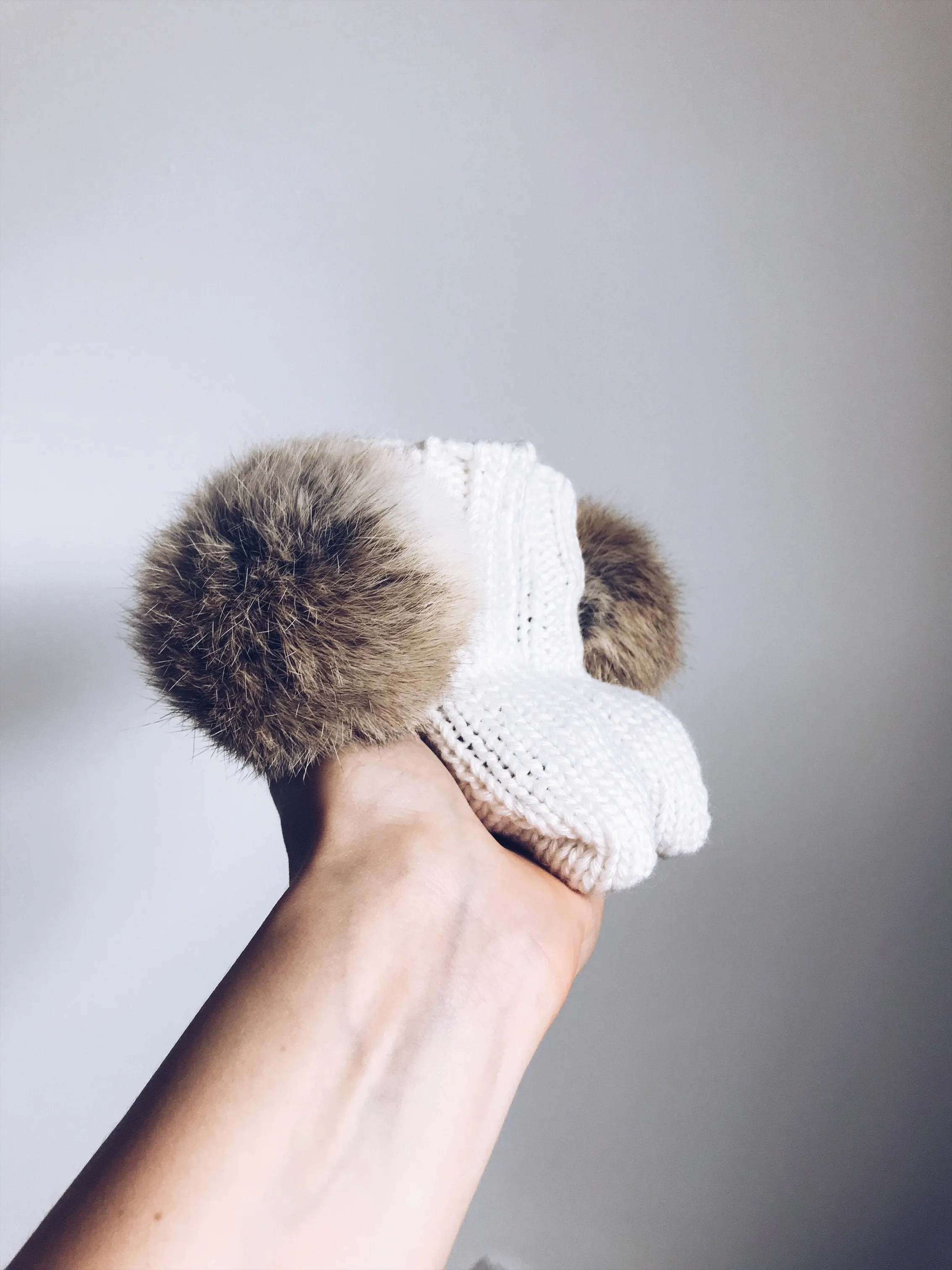 MILOVES Signature Hand Knitted baby booties with rabbit fur pompoms