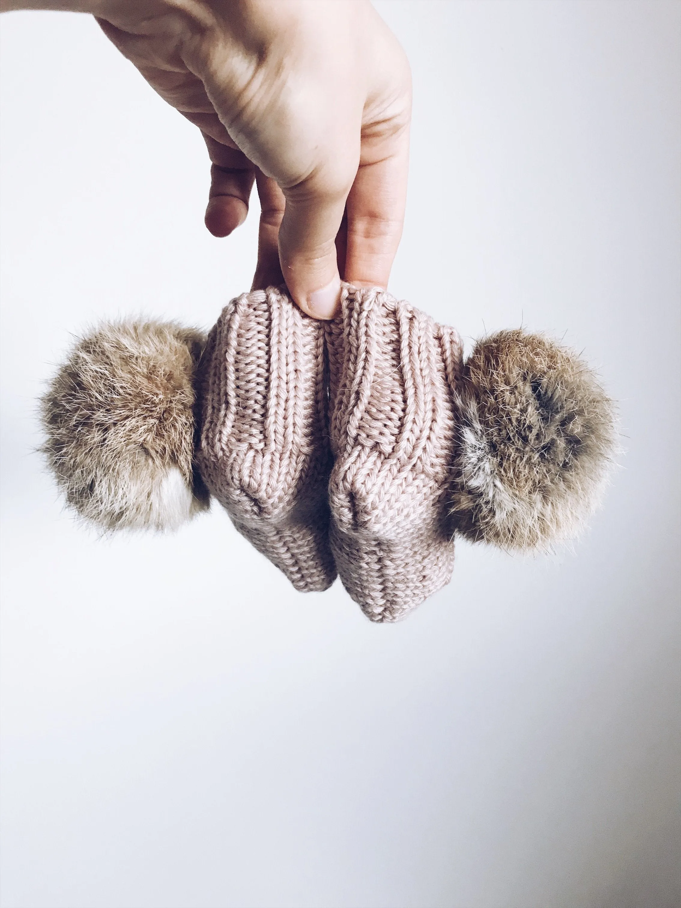 MILOVES Signature Hand Knitted baby booties with rabbit fur pompoms