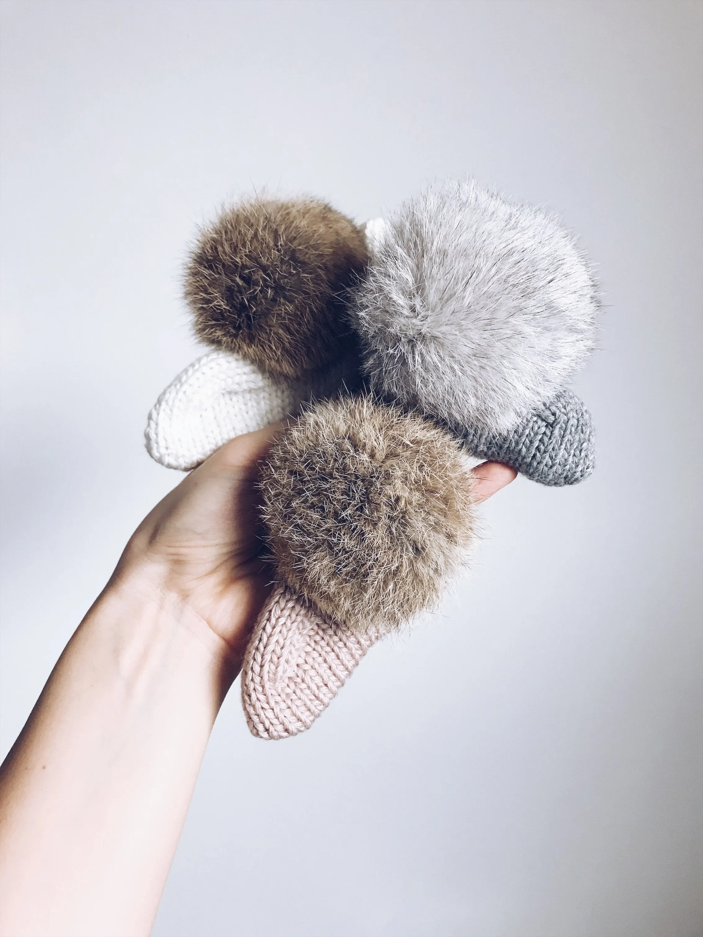 MILOVES Signature Hand Knitted baby booties with rabbit fur pompoms