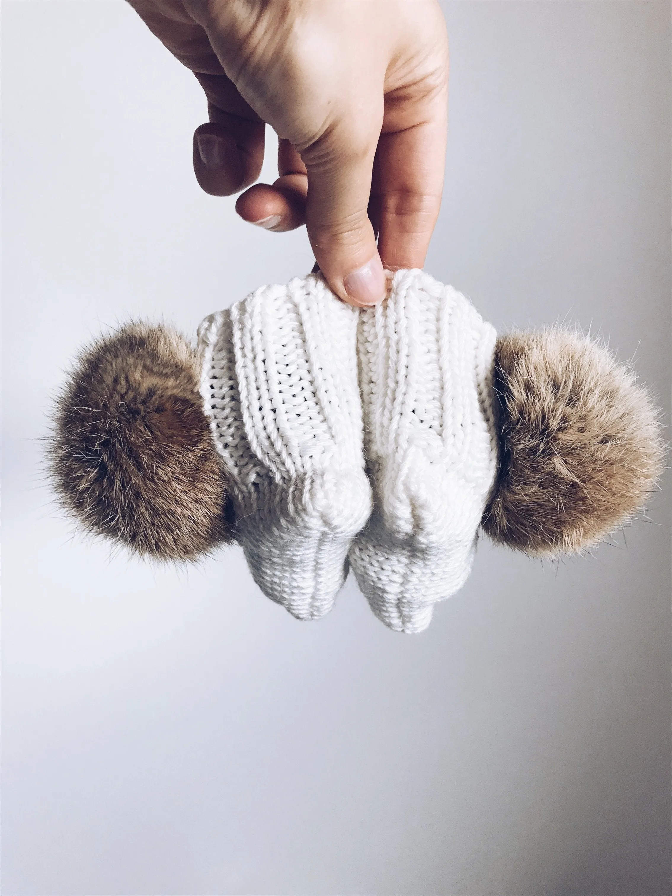 MILOVES Signature Hand Knitted baby booties with rabbit fur pompoms