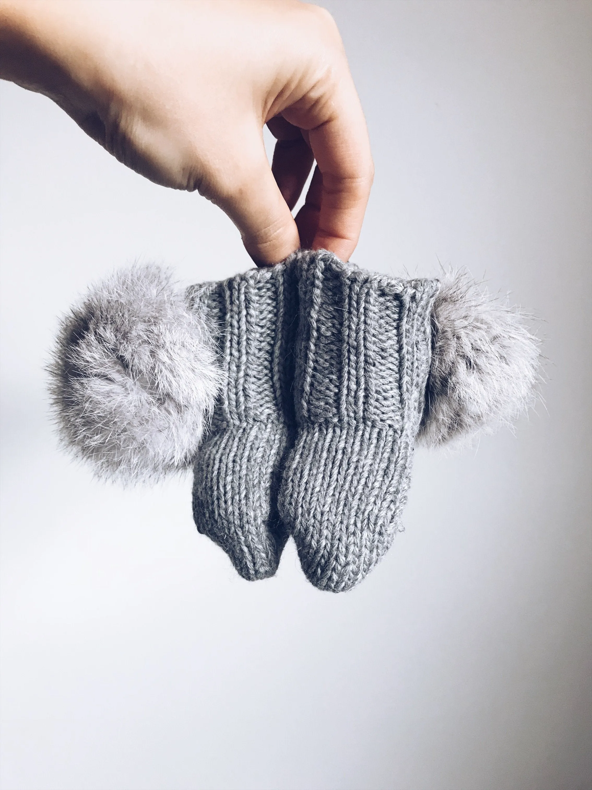 MILOVES Signature Hand Knitted baby booties with rabbit fur pompoms