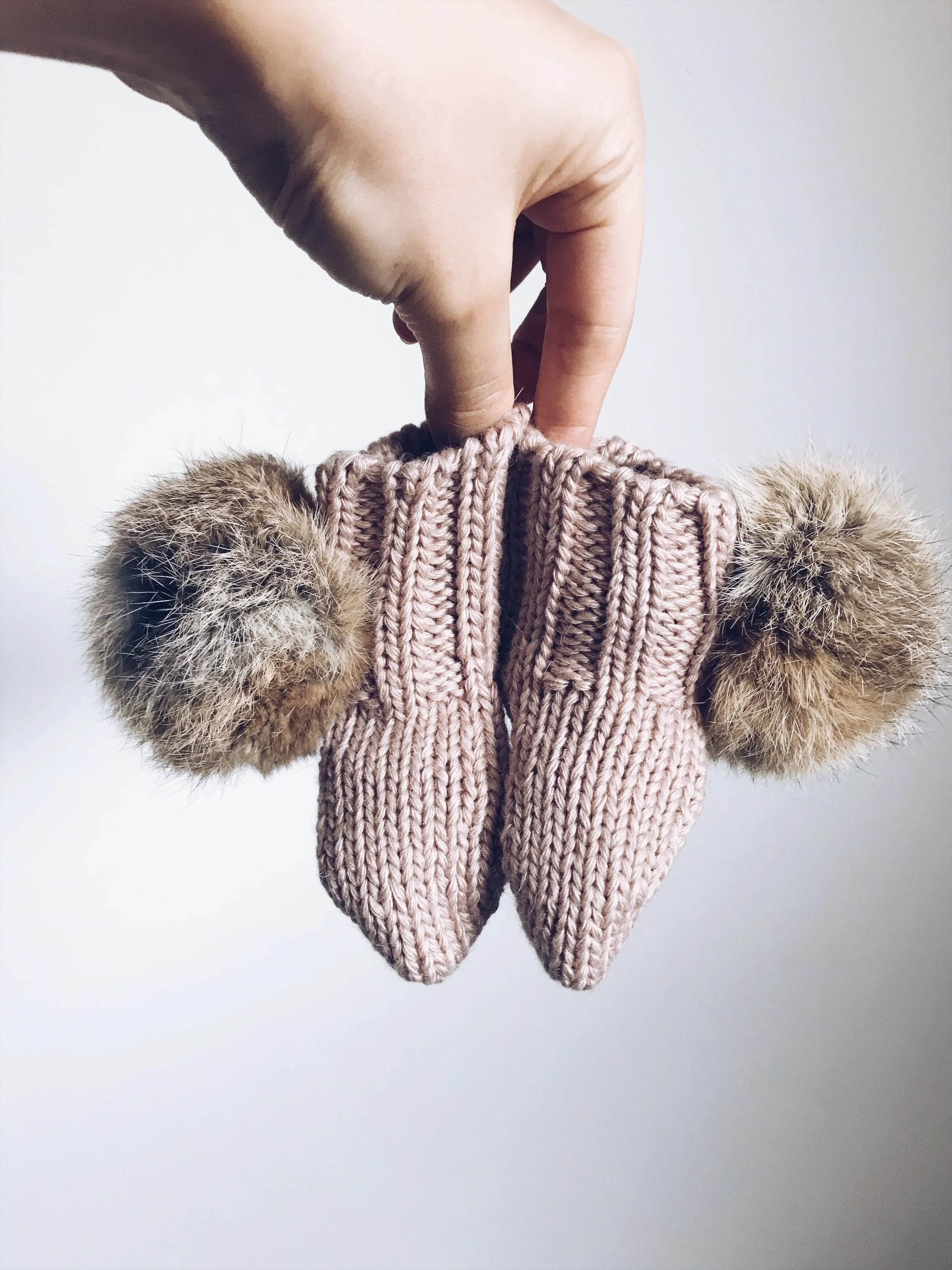 MILOVES Signature Hand Knitted baby booties with rabbit fur pompoms