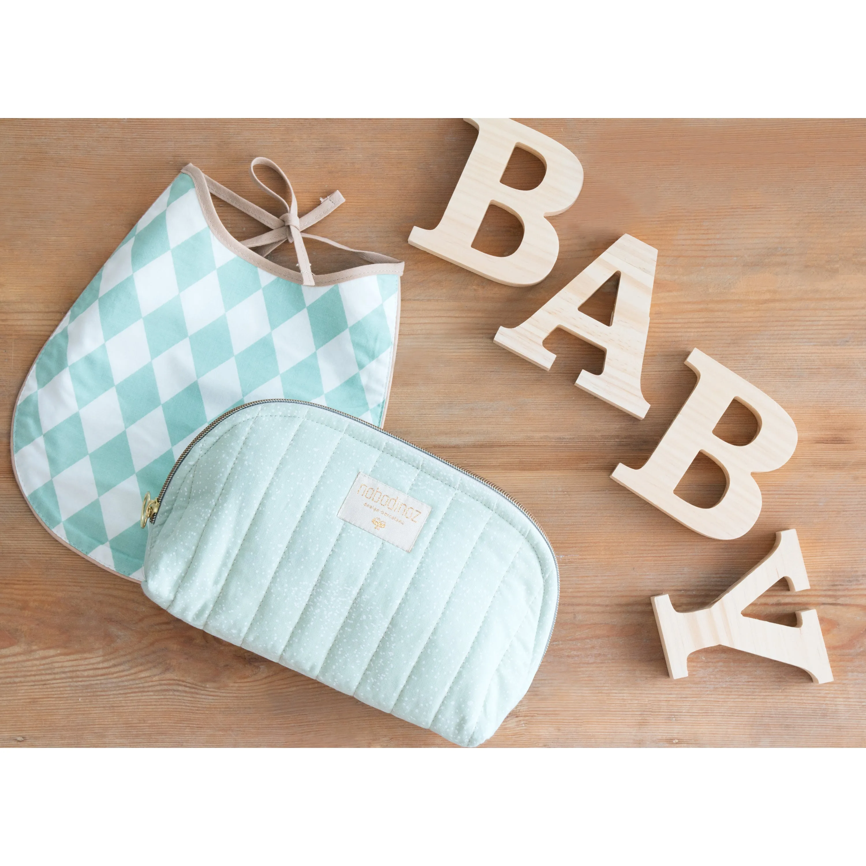 nobodinoz Bib Oil Cloth Black Honey Sparks